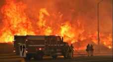 Uncontainable California wildfire kills at least 23 people
