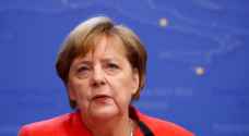 Merkel warns Trump against trade war