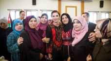 Queen Rania visits Ma’an, meets women activists, community leaders
