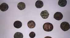 Four arrested for selling antique coins