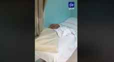 Patient films cat sleeping on hospital bed at Al-Bashir