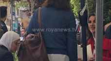 Roya cameras capture photos of Queen Rania while sitting in a cafe