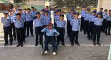 Young boy with physical disability achieves dream in being security officer