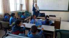 Photos: Teachers of school in Karak break strike, give lessons to students