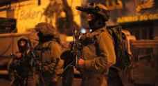 Israeli forces arrest 14 Palestinians in West Bank