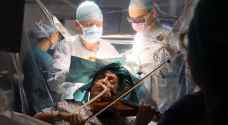 Musician plays violin during brain surgery in London