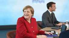 Merkel, Macron call for caution in face of delta mutant
