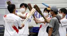 Olympic flame arrives in Tokyo after 'heartbreaking' fan ban