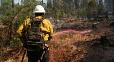 Firefighters tackle California wildfire as heat wave grips parts of US