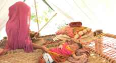 Flood-born: Nothing but mud as mother, infant return to Pakistan home
