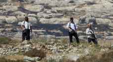 Israeli Occupation settlers raze road near ....