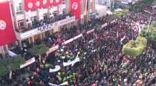 Tunisia unions protest over economic woes, official's arrest