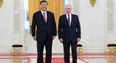 Putin says held 'meaningful and frank' talks with Xi