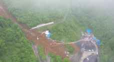 China landslide death toll rises to 19 as rescue ....