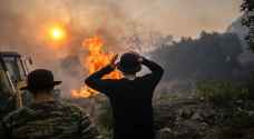 New fires in heat-hit Greece force evacuations