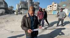 Israeli Occupation Forces distribute leaflets in Gaza, seeking information on captives