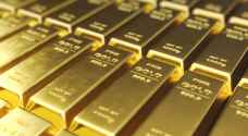 Global gold prices hold steady near record high amid inflation
