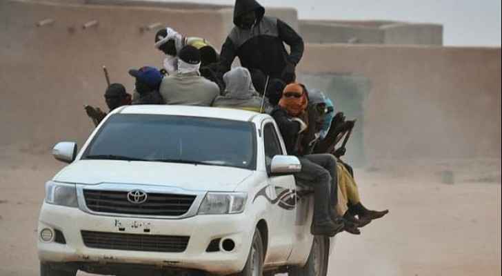 A vehicle carrying migrants travels through Agadez, Niger, en route to Libya in June 2015. (AFP) 
