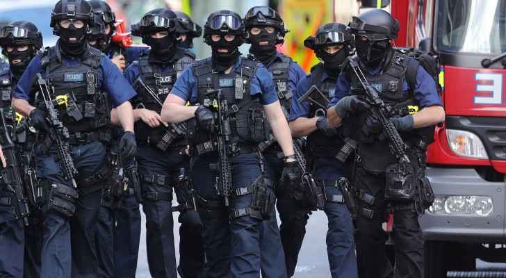 Counterterrorism officers near London Bridge in the British capital on Sunday morning. (Getty) 