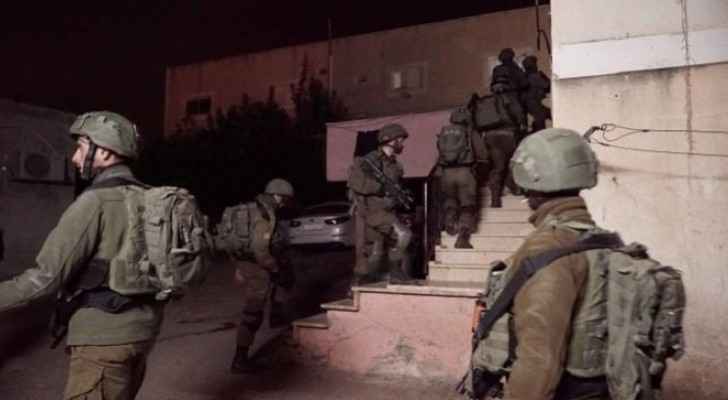 14 Palestinians detained by occupation forces