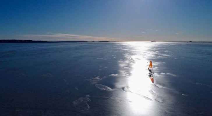 Finnish ice surfers carve up frozen sea