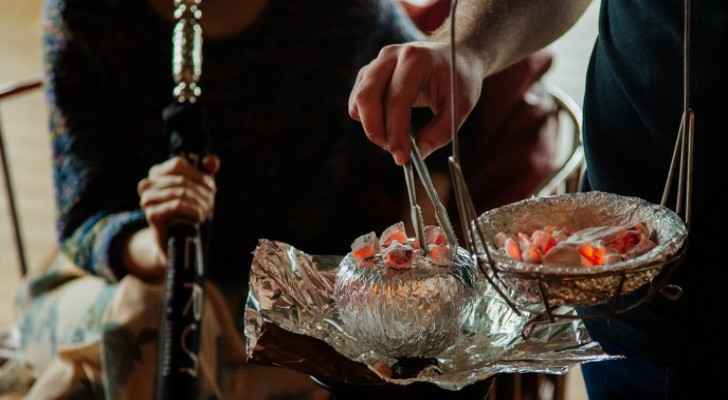 Person arrested for smoking shisha in cafe in Amman while being infected with COVID-19