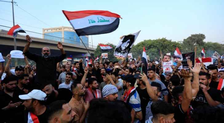 Hundreds of protesters in Baghdad demand regime change