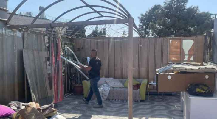 Palestinian forced by Israeli Occupation to demolish part of his house in Jerusalem