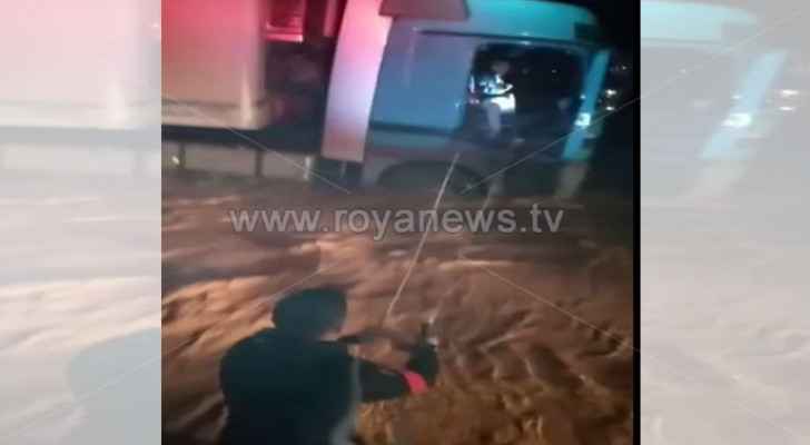 Two individuals rescued after getting trapped in partially submerged vehicle in Mafraq