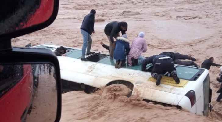 Student bus plunges into torrent of water in Ma'an