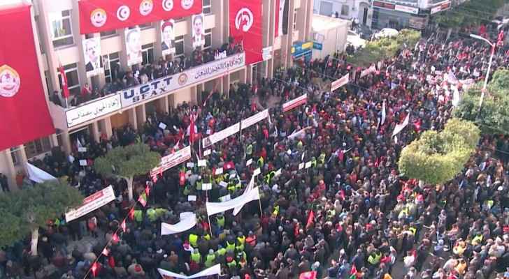 Tunisia unions protest over economic woes, official's arrest