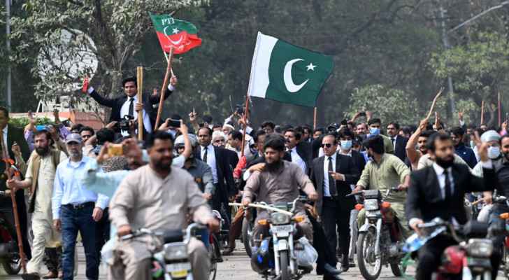 Ex-PM Khan resists arrest under Pakistan's 'law of the jungle'