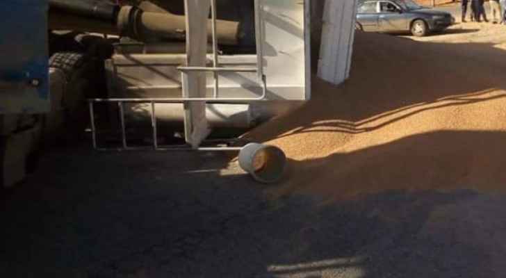 Vehicle loaded with wheat overturns in Aqaba