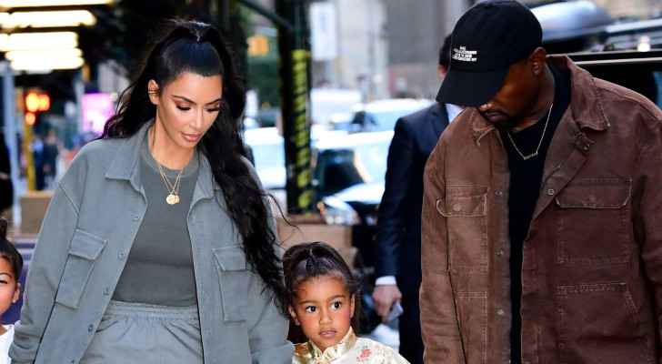 Kanye West, Kim Kardashian, and their daughter North West