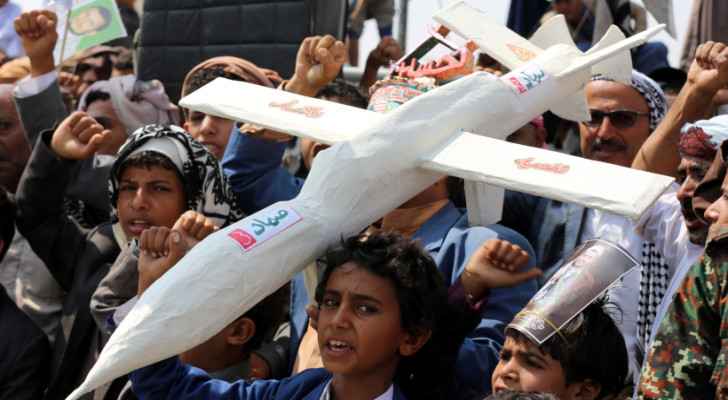 Children carry a mock drone during a pro-Houthi rally in Saada, Yemen. (Sep. 10, 2019) (Saada, Yemen) 