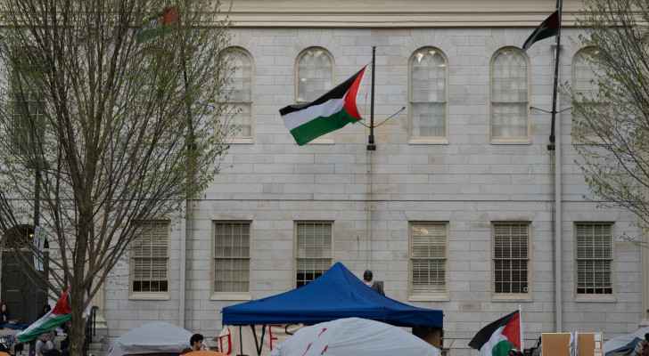 Palestinian flags flew over University Hall during the encampment, later removed by Harvard police (Credit: Elyse C. Goncalves)