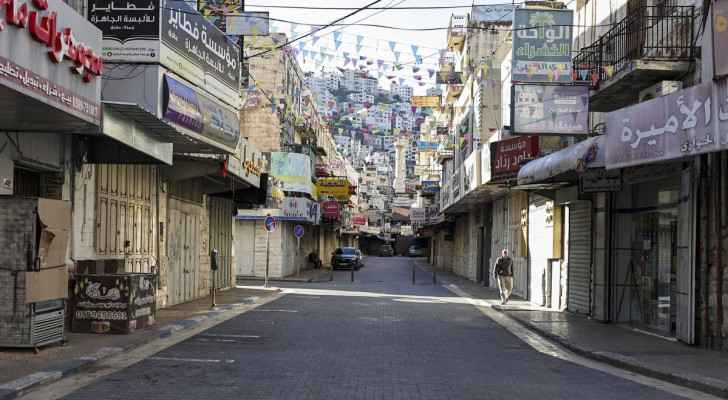 The West Bank on a general strike in protest of the 'Israeli' aggression. (File photo: December 11, 2023) (Photo: AFP)