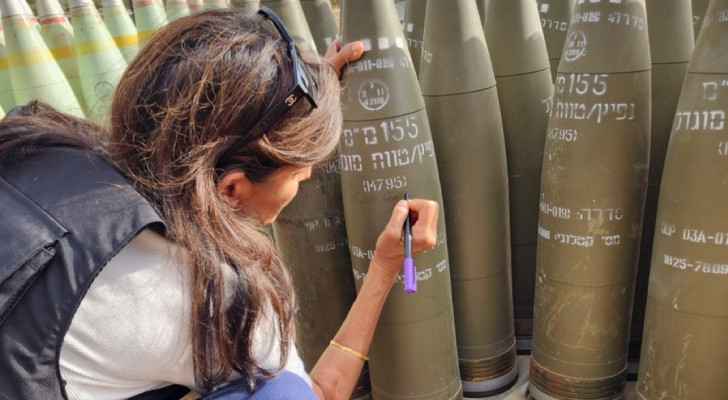 Nikki Haley signing "Israeli" artillery shells at the northern border. 