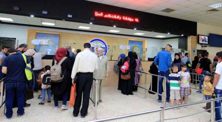 Palestinians in Al Karama Crossing Post Office