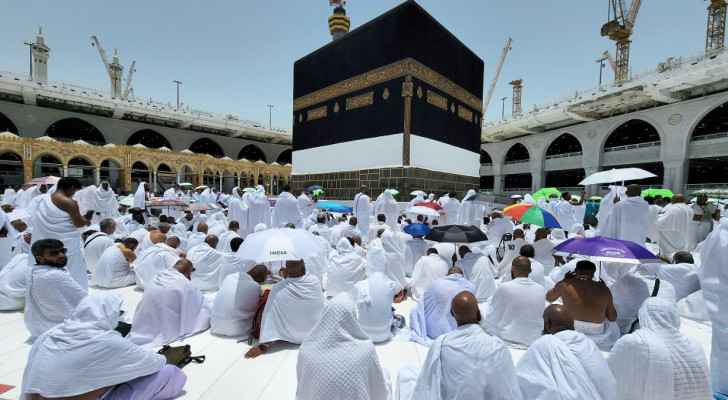 Muslim pilgrims perform Friday prayer around the Kaaba at the Grand Mosque in the holy city of Makkah. (June 24, 2022) 