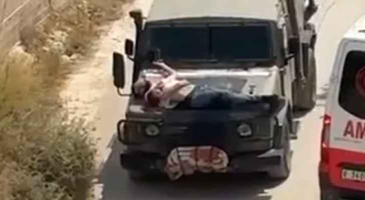 Mujahed Abadi strapped to IOF vehicle as human shield